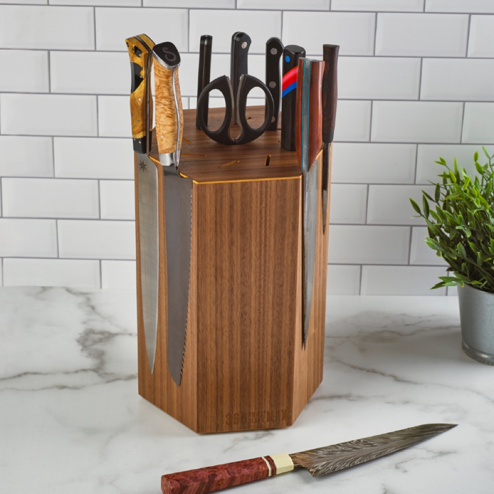 The MAX with a collection of kitchen knives